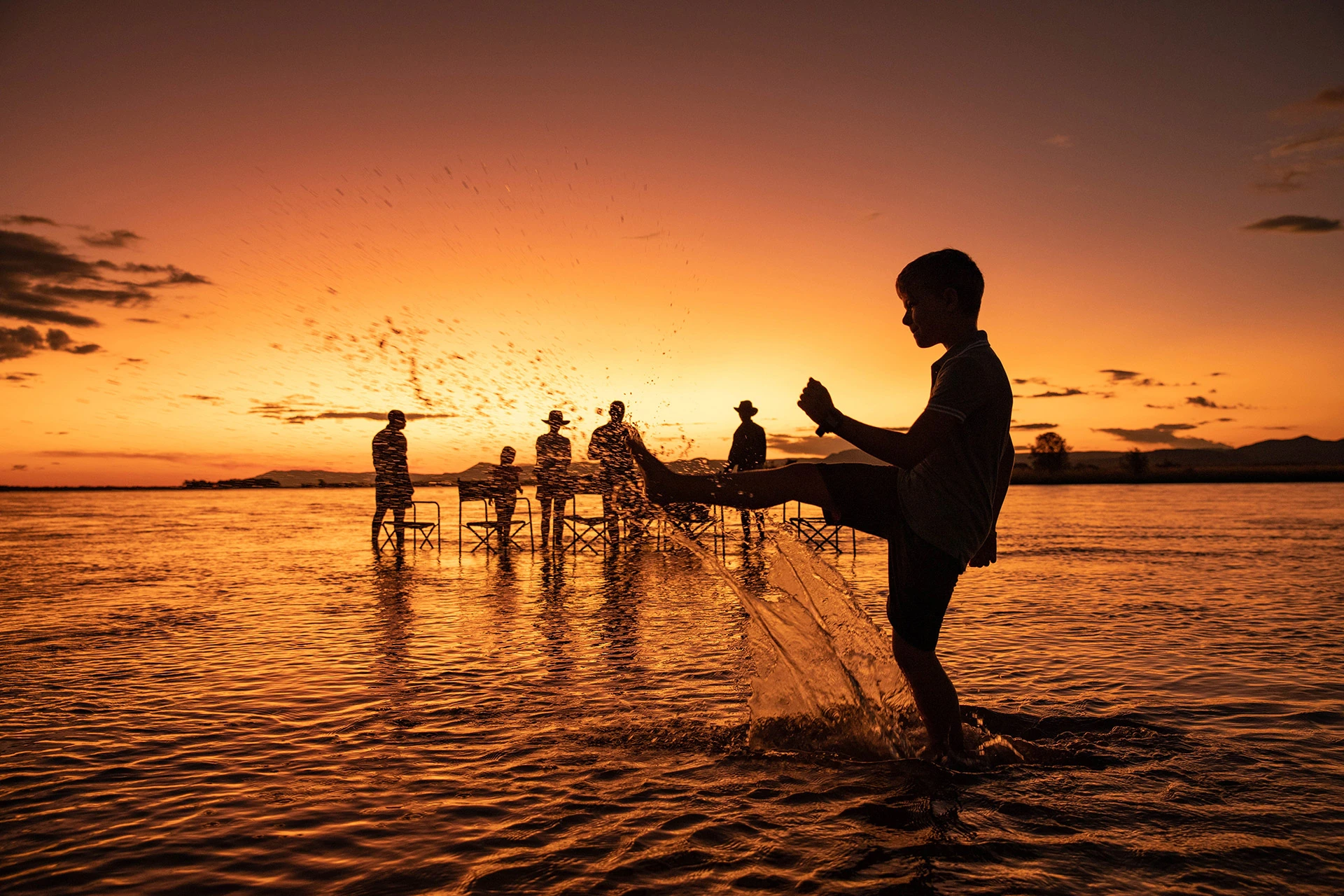 12Great-Plains-Tembo-Plains-Camp-river-sundowners.jpg