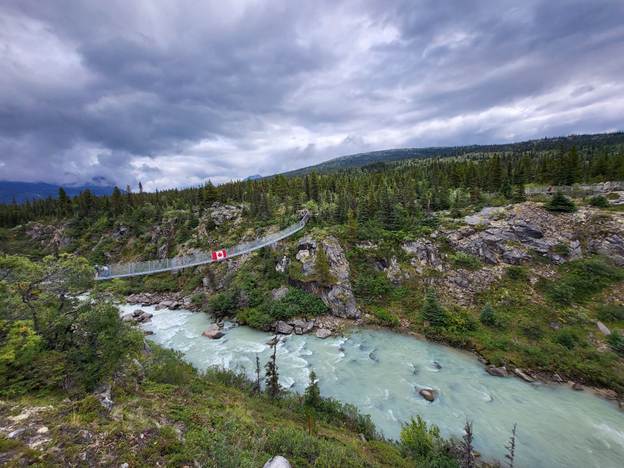 A bridge over a river

AI-generated content may be incorrect.