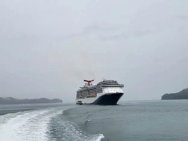A cruise ship sailing in the sea

AI-generated content may be incorrect.