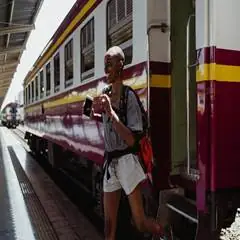 A person walking on a train platform

AI-generated content may be incorrect.