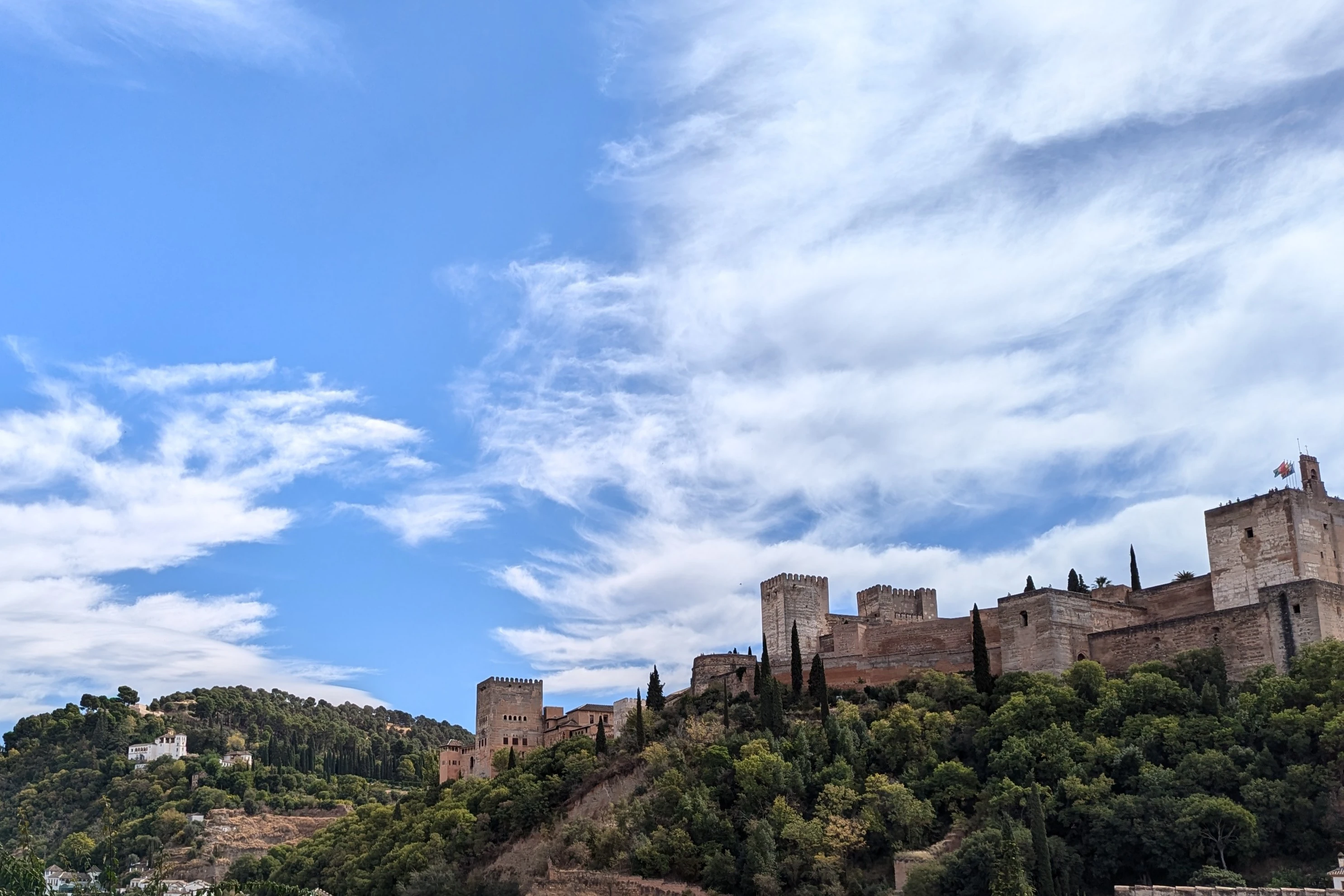 Exterior shot of Alhambra contrasting a blue sky