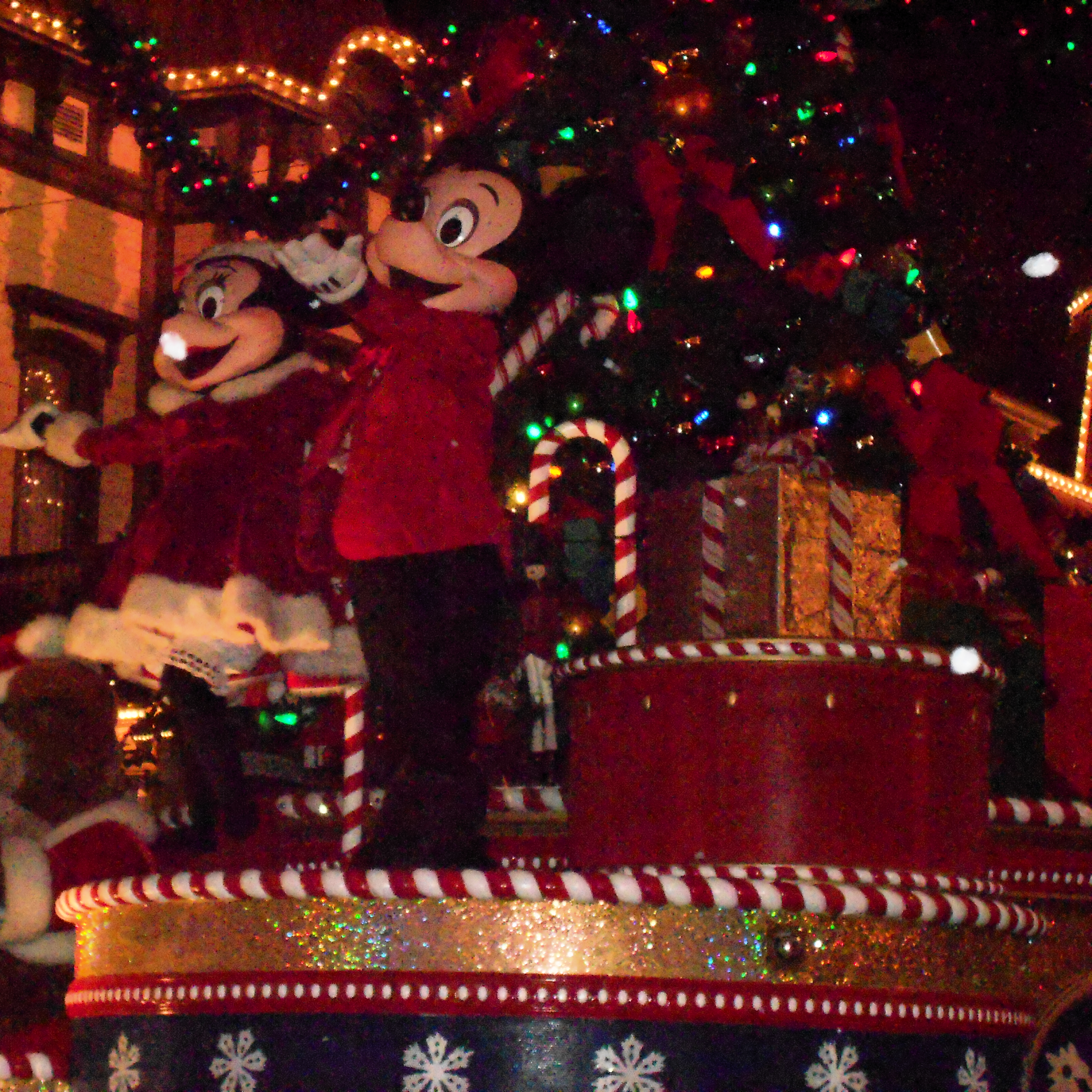 family walking down Main Street USA
