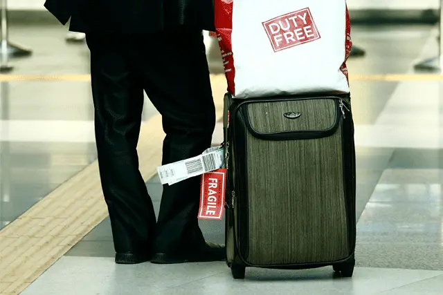 Why are goods sold in a duty free store so much cheaper?