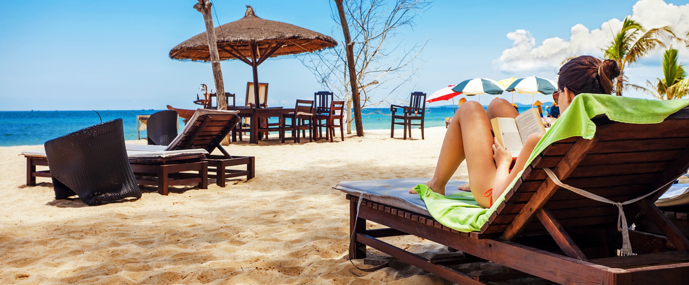 Relaxing-and-reading-on-the-beach.jpg