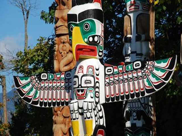 Totems, Canyon And Mountain