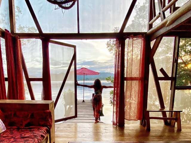Superhosts Ulrich and Elisabeth’s eco-retreat on a roadless island has a coral reef for a front yard and a mangrove forest out ba