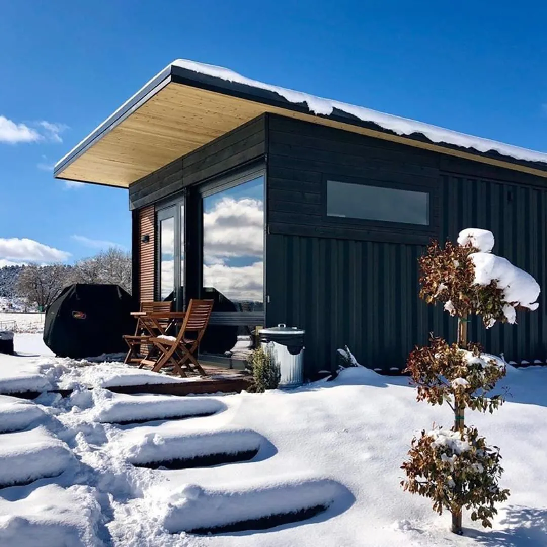Tiny cabin on the outside, luxury condo on the inside