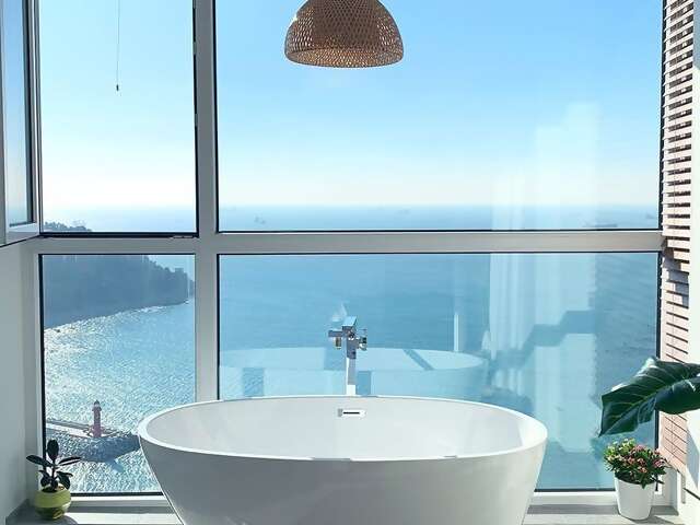 Superhost Jay’s elegant apartment is perched on the coast of Yeong-do, the island that forms one corner of the city