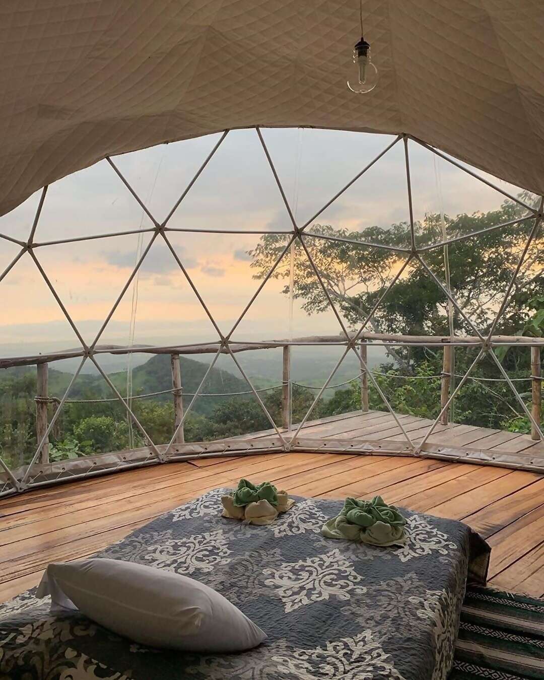 This remote dome in the jungle comes with bedside binoculars for spotting tropical birds by day and planets by night