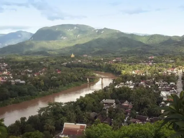 Thailand to Laos: Kanchanaburi, Chiang Rai & Laos Countryside