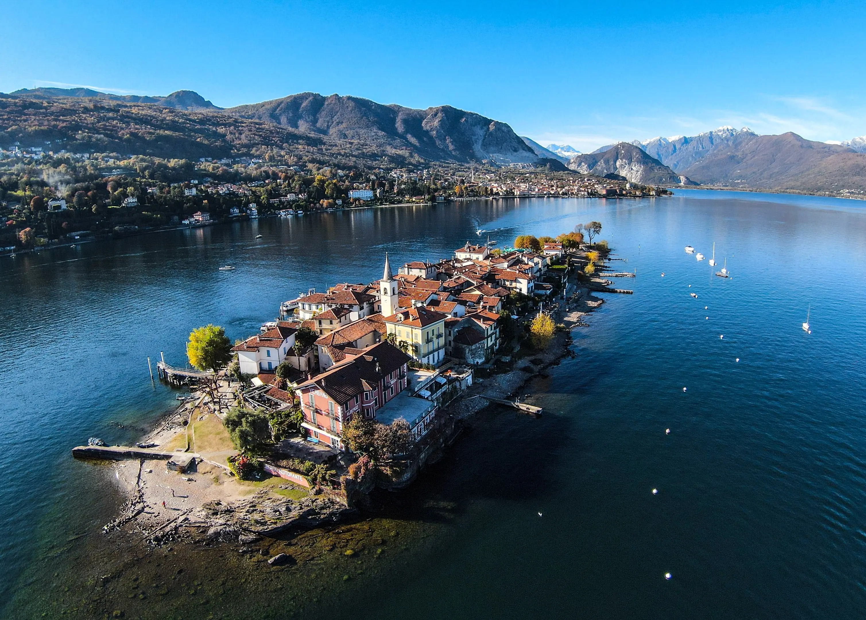 Alpine Lakes & Scenic Trains featuring a cruise on Lake Maggiore and scenic trains in Switzerland & Italy