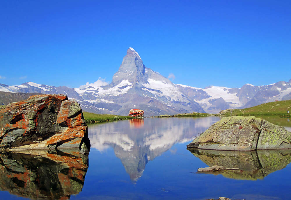 Alpine Lakes & Scenic Trains featuring a cruise on Lake Maggiore and scenic trains in Switzerland & Italy